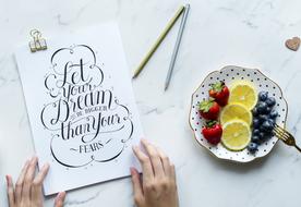 calligraphy and fruit dessert