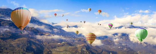 journey on hot air balloons over the mountains in South Tyrol