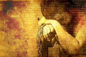 silhouette of a man with chains