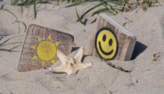 wooden toys on sand