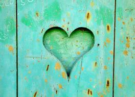 heart carved in a wooden door