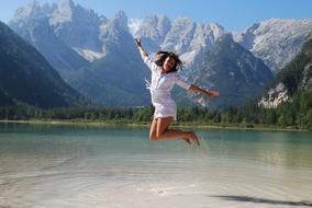 happy jumping young woman