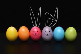decorative easter eggs in the shape of rabbits