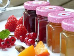 Jars with the colorful fruit jams