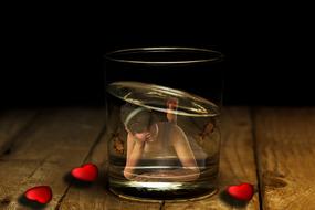 fantasy girl and hearts reflection on glass