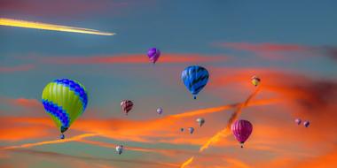 hot air balloon travel in colorful sky