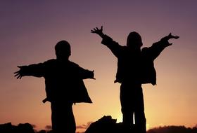 silhouettes of playing children