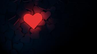 red heart at dark background