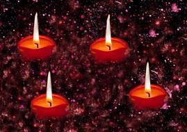 burning candles on the background of the universe