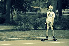 boy on skateboard in monochrome