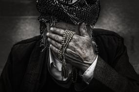 black and white portrait of a sad indian man
