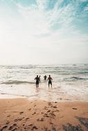 Beach Sand people run