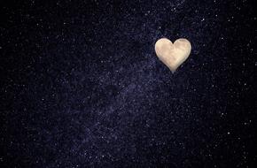 heart shaped moon on a background of the starry sky