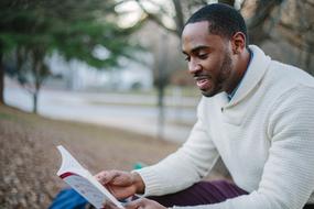 happy young man with book