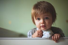 Cute Baby in a crib close up