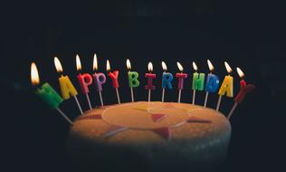 cake with candles for birthday In the dark