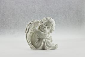 little white angel as a spiritual symbol