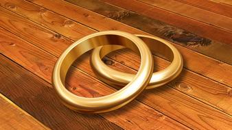 golden rings on a wooden surface close-up