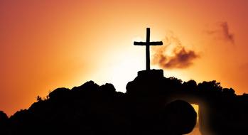 cross silhouette on the evening sky