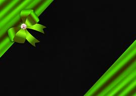 black background with green ribbon with diamond
