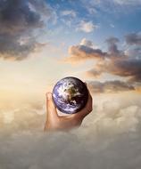 Clipart of Globe Hand Clouds