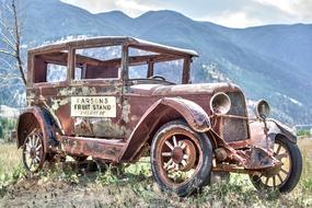 old rusty truck in a mountainous area