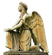 tombstone in the cemetery in the form of an angel