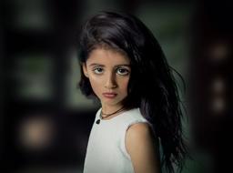 photo of a beautiful girl with long black hair