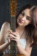 Model Portrait with a guitar