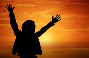 joyful person at sunset