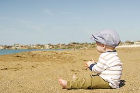 Toddler Sitting sand