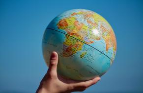 photo of globe in hand