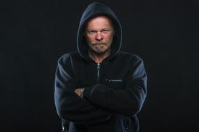 Angry mature Man in black Hoodie