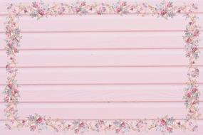 vintage pink background, floral frame on wooden planks