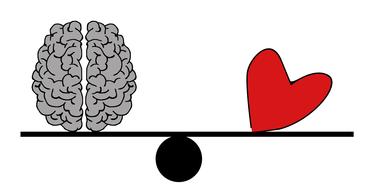 painted heart and brain on scales
