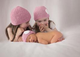 Newborn Baby and sisiters