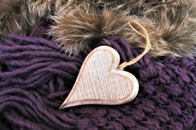 wooden heart on wool