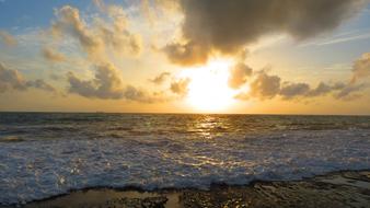 atmospheric sunset on the beach