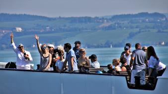 tourists sail by ferry on Lake Constance