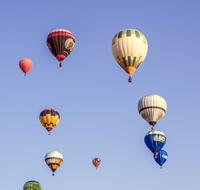 Beautiful and colorful hot air balloons in the blue sky in Igualada