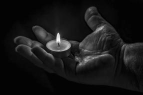 Candle on Hand, black and white