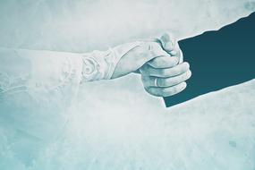 monochrome photo of newlyweds hands