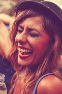 photo of a tanned laughing girl