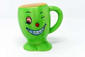 creative green mug as an illustration