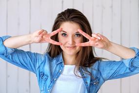 happy woman in denim shirt