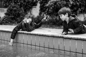 boys play near the water