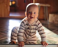 baby in striped pajamas