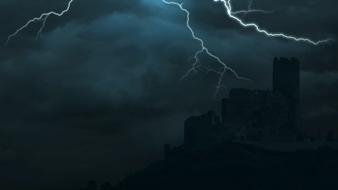 spooky storm and lightning over a medieval castle