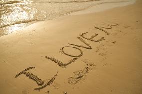 declaration of love in the sand on the beach