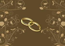 wedding rings at vintage floral background